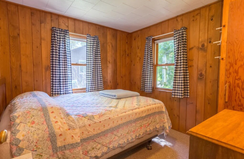 Cottage bedroom at Fisher's Lakeside Cottages.