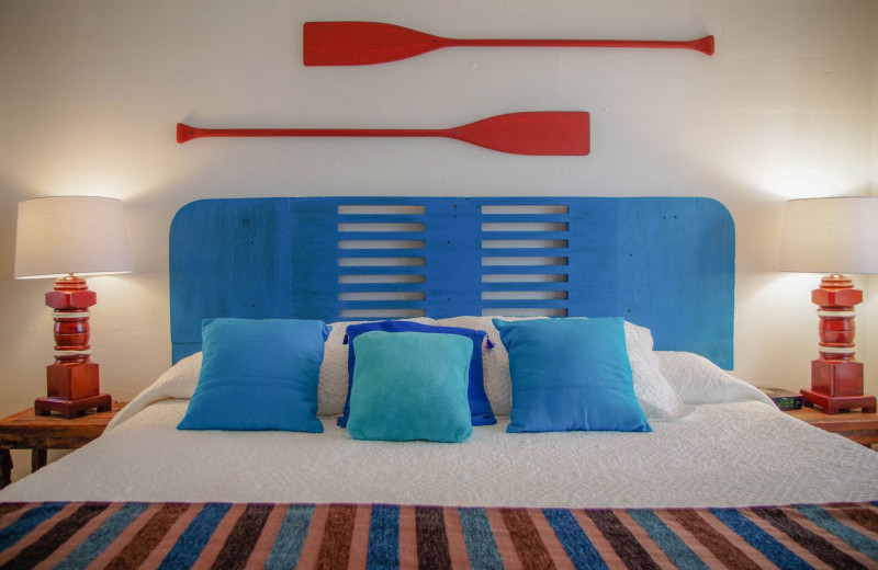 Guest bed at Beacher's Lodge Oceanfront Suites.