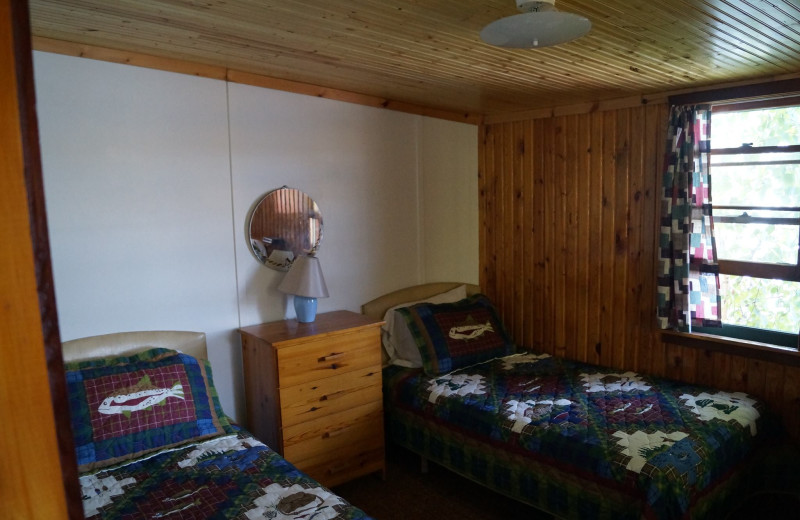 Cabin bedroom at Anderson's Starlight Bay Resort.