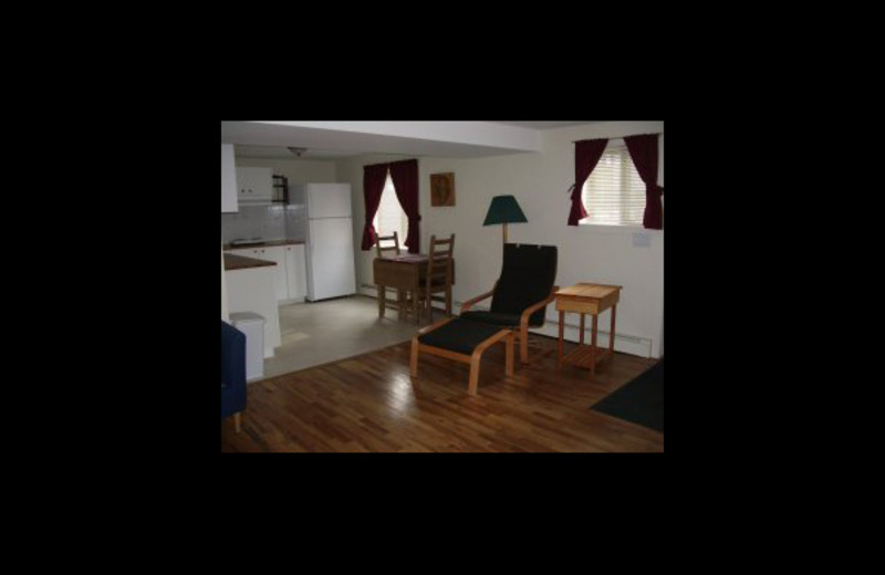 Kitchen and living room at Cottage Bed & Breakfast.