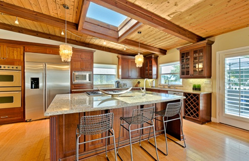 Rental kitchen at Seabreeze Vacation Rentals, LLC-Orange County.