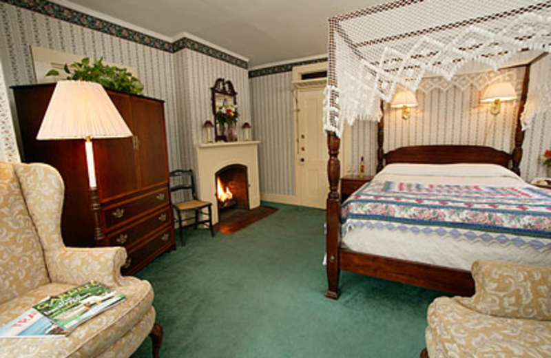 Fireplace bedroom at The Village Inn.