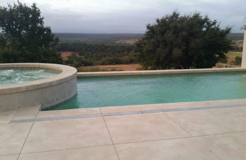 Outdoor pool at Greystone Castle Sporting Club.