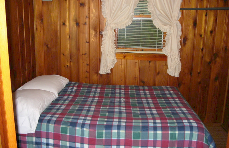 Cabin bedroom at The West Shore Resort.