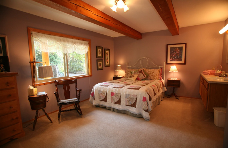 Cabin bedroom at Western Pleasure Guest Ranch.