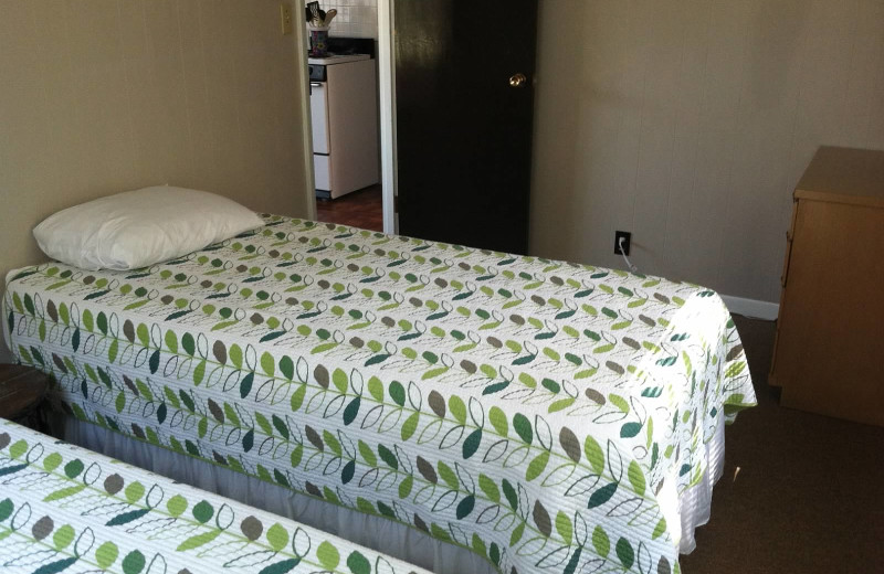Cabin bedroom at Lake Breeze Resort.