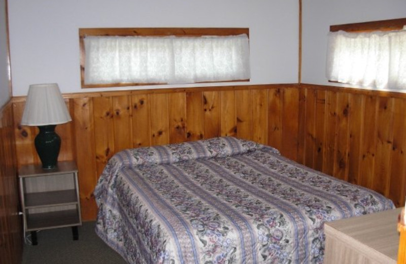 Cottage bedroom at Diamond Cove Cottages.