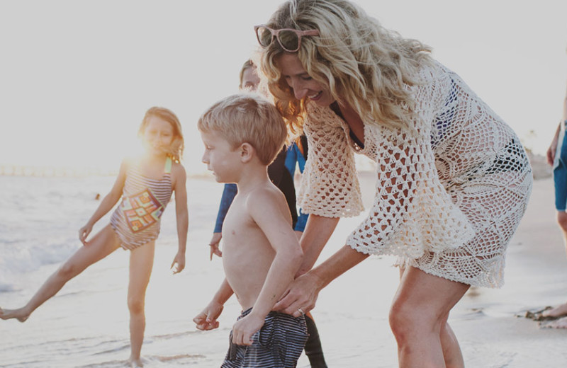 Family on beach at Anchorage Inn.