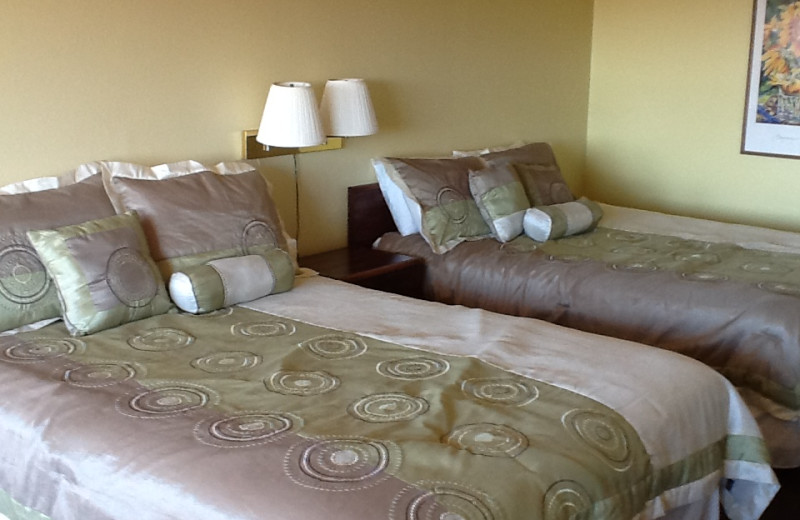 Guest room at Pointe West Resort & Suites.