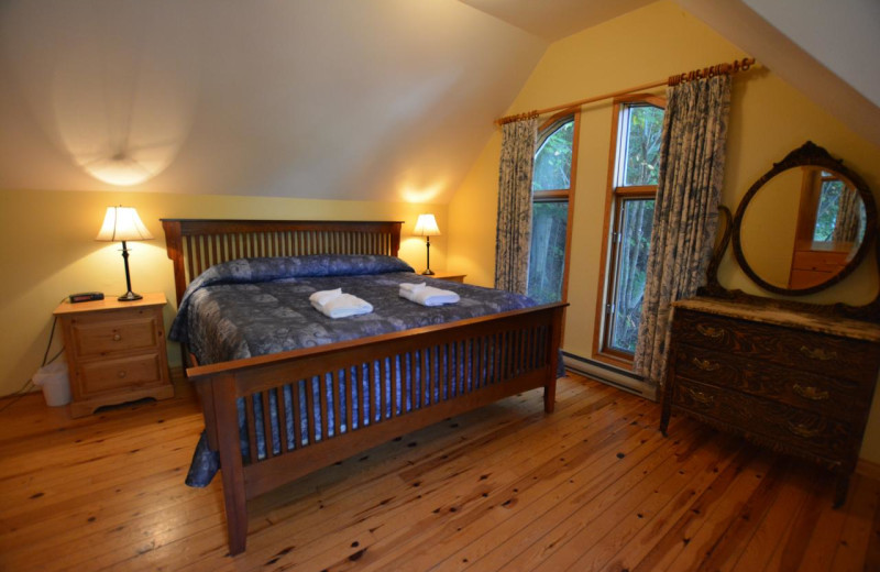 Cottage bedroom at Port Cunnington Lodge & Resort.