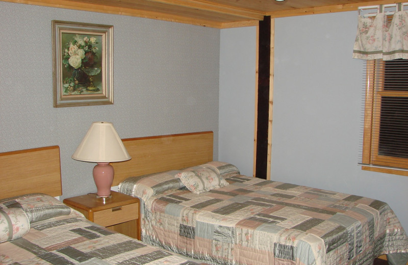 Cabin bedroom at Hollywood's Resort.