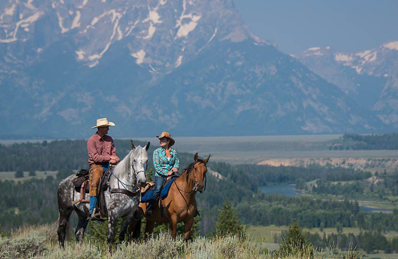 Horseback riding at Triangle X Ranch.