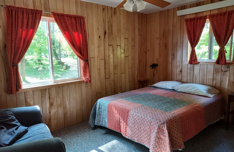 Cottage bedroom at Woodlawn Resort.