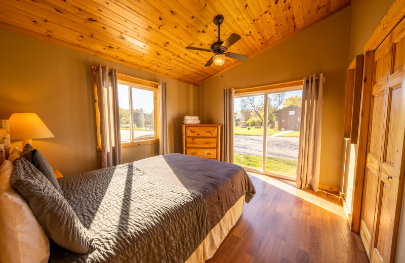 Cabin bedroom at Appeldoorn's Sunset Bay Resort.