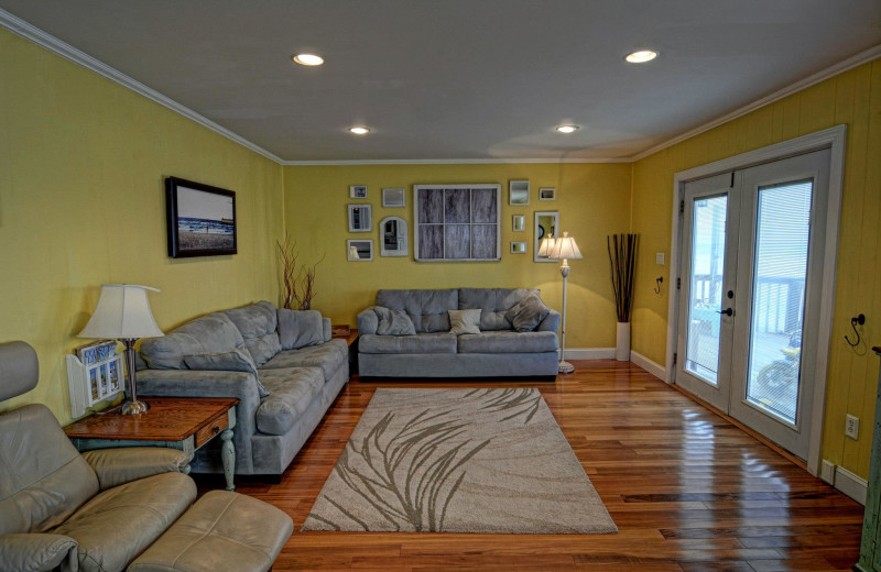 Vacation rental living room at Century 21 Action Inc.