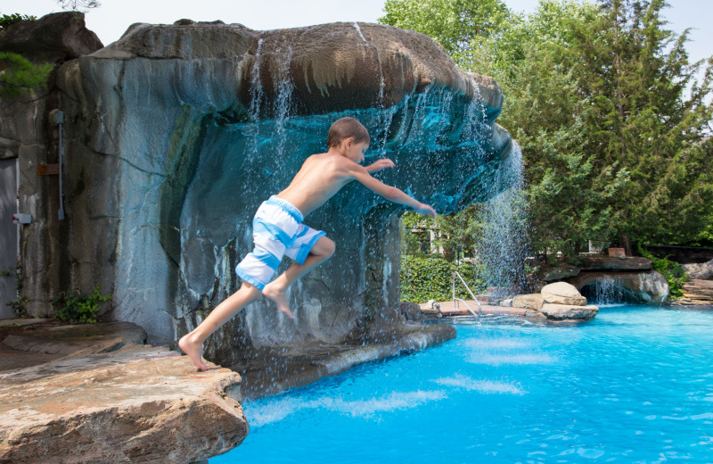 Jumping in the pool at Crystal Springs Resort.