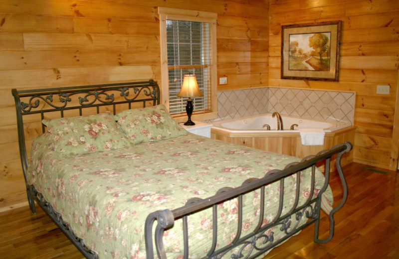 Whirlpool bedroom from As Good As It Gets cabin at New River Trail Cabins.