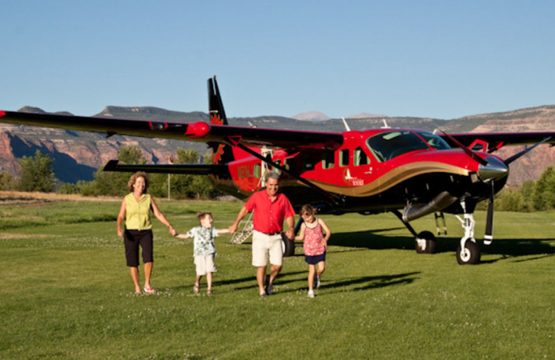 Family By Plane at Gateway Canyons Resort 