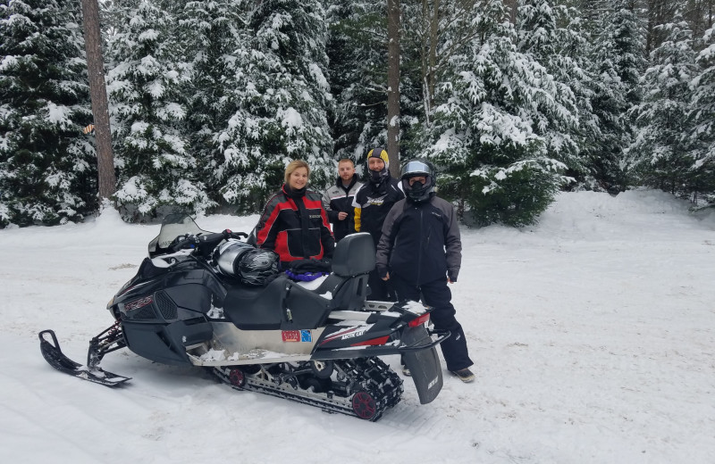 Snowmobiling at Hiller Vacation Homes.