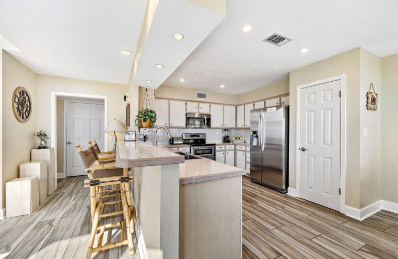 Rental kitchen at Gary Greene Vacation Rentals.