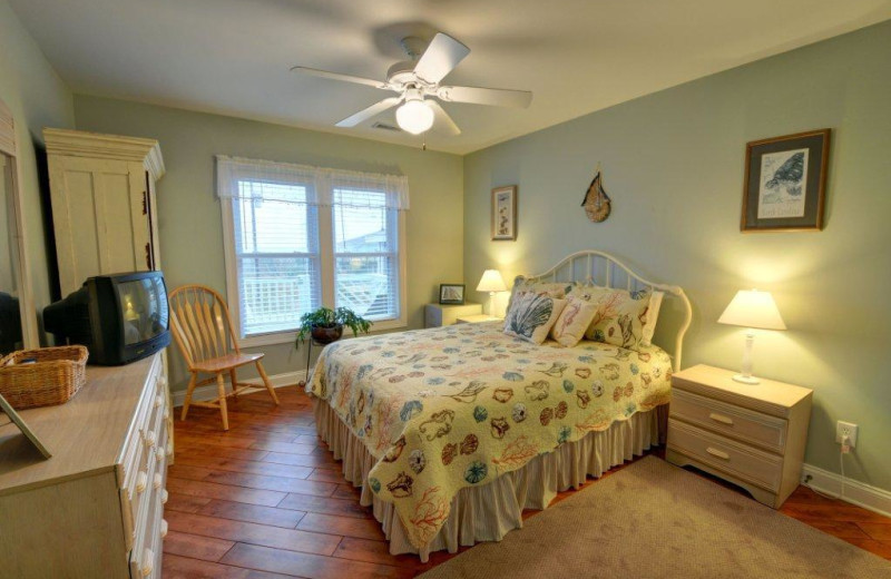 Vacation rental bedroom at Century 21 Action Inc.