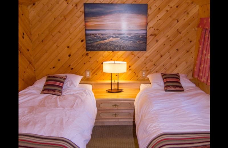 Cabin bedroom at Obabika Resort.