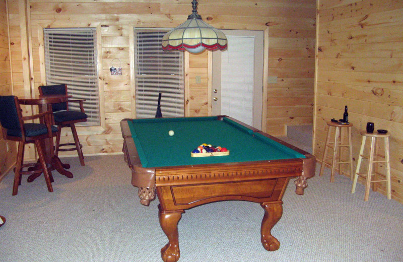 Cabin billiards table at Black Bear Cabin Rentals.