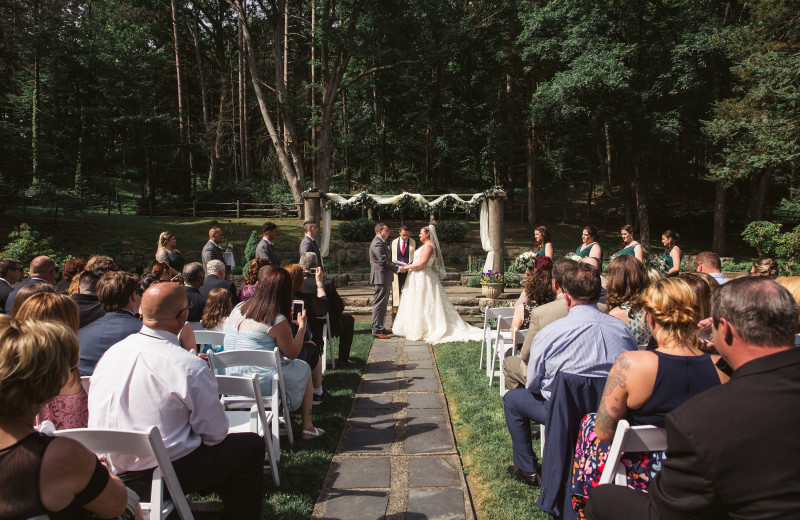 Wedding ceremony at Arrow Park Lake and Lodge.