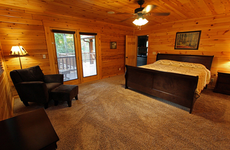Cabin bedroom at Cut Above Cabins.
