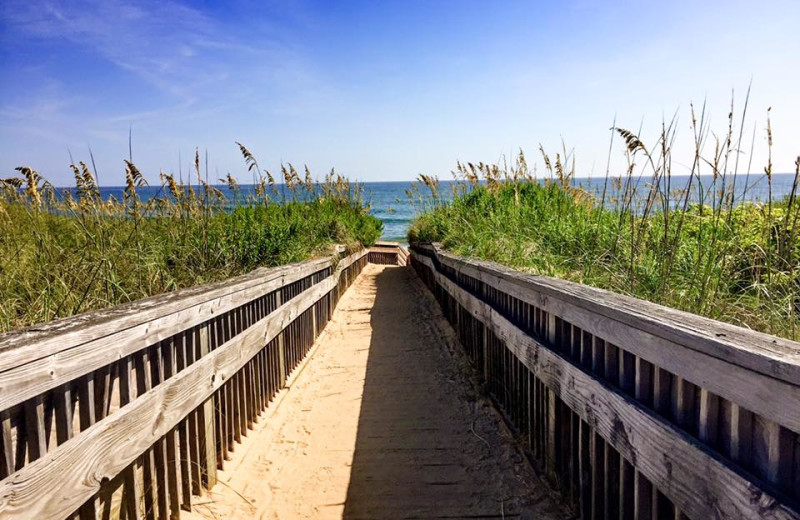 Boardwalk to beach at Beach Realty & Construction.