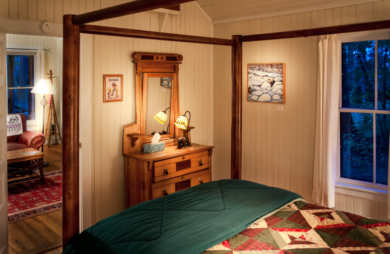 Cabin bedroom at White Pine Camp.