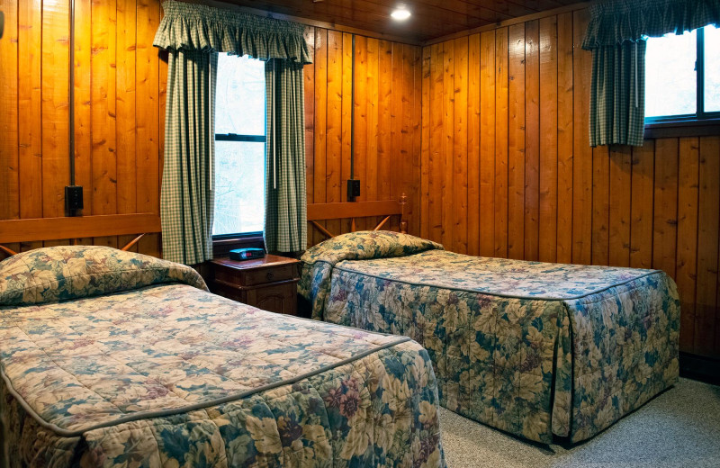 Cabin bedroom at Mountain Springs Lake Resort.