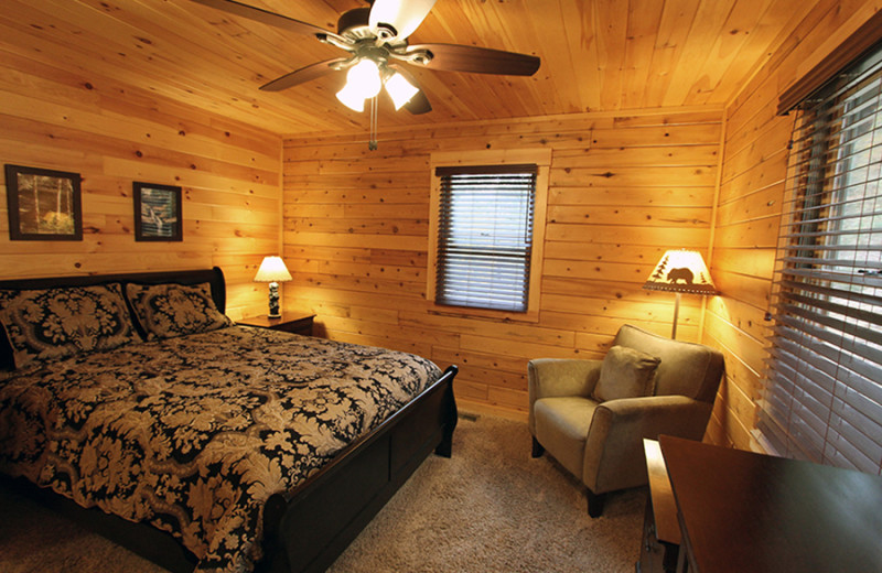Cabin bedroom at Cut Above Cabins.