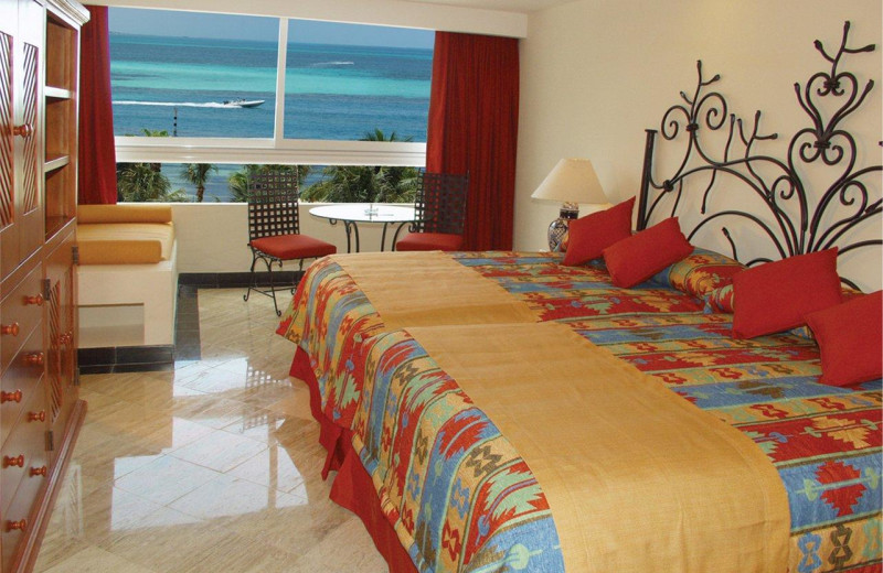 Guest room at Grand Oasis Caribbean Resort.