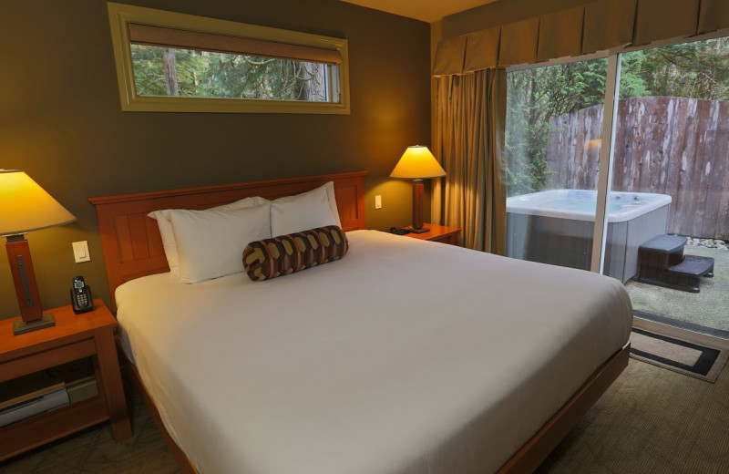 Cottage bedroom at Long Beach Lodge Resort.