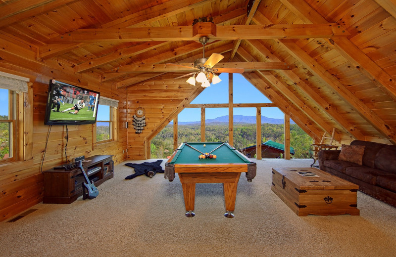 Cabin living room at Cabin Fever Vacations.