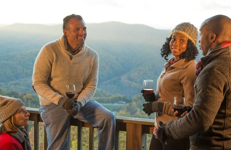 Couples on balcony at House Mountain Inn.