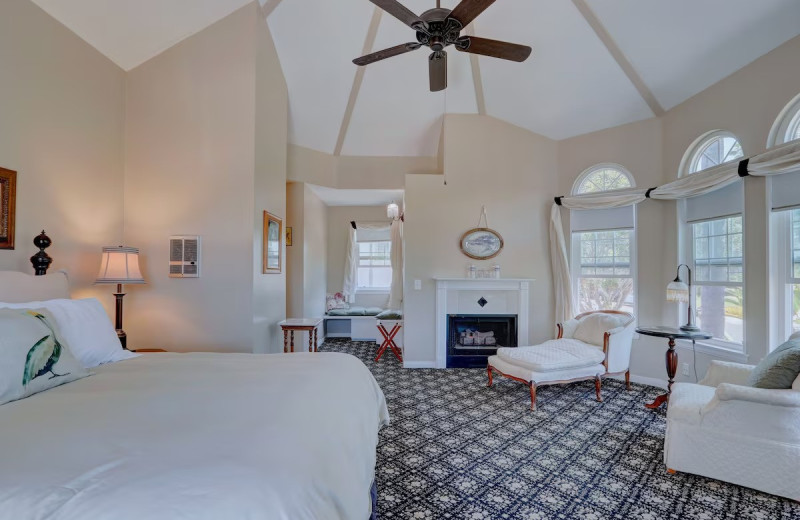 Guest room at Pelican Cove Inn Bed 