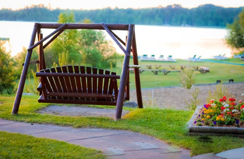 Swinging bench over lake at Thunder Lake Lodge. 