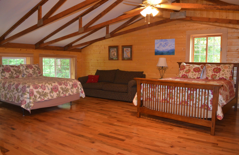 Cabin bedroom at Creeks Crossing Cabins.