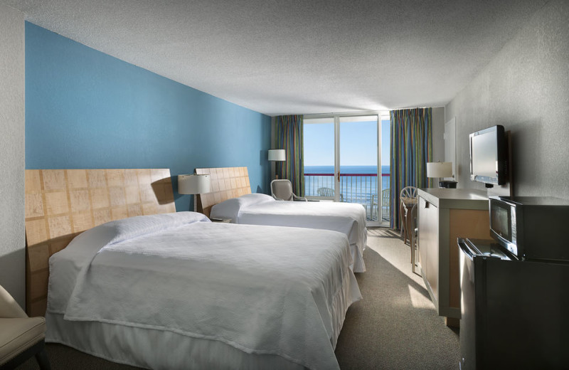 Guest bedroom at Crown Reef Resort.