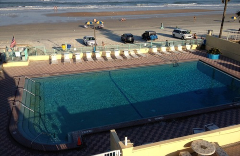 View of pool and beach at Fountain Beach Resort.