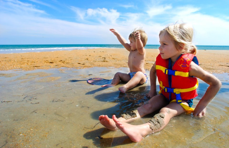 Kids Playing at Beach at Hatteras Realty