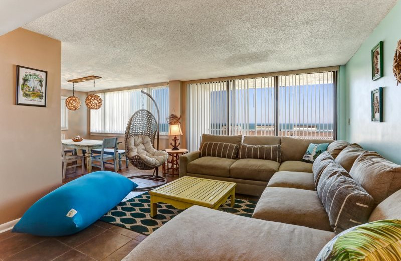 Rental living room at Amelia Rentals and Management Services.