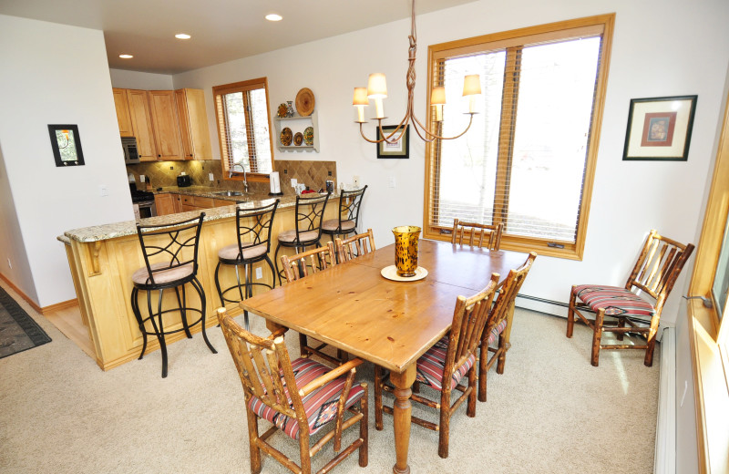 Rental kitchen and dining area at Steamboat Lodging Properties.