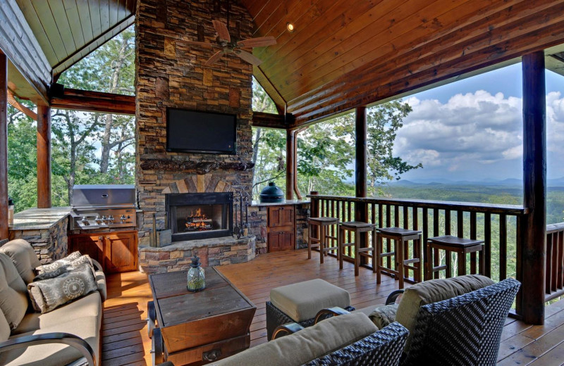 Cabin patio and grill at Mountain Top Downtown Lodging.