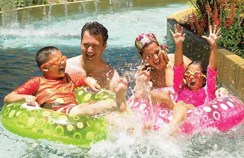 Family floating down lazy river at JW Marriott San Antonio Hill Country.