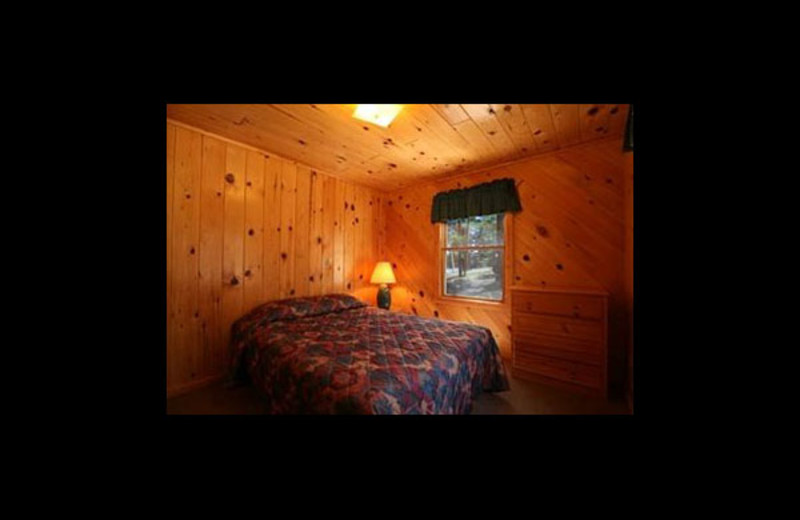 Cabin bedroom at Broadwater Lodge.