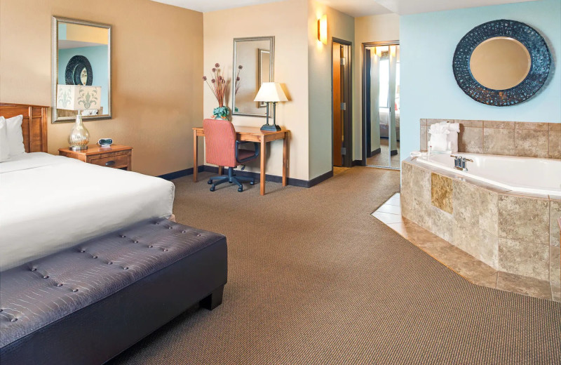 Guest room at Ramada Plaza by Wyndham Omaha.