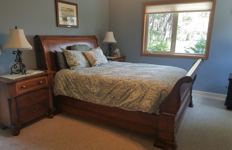 Rental bedroom at Oceanfront Getaways.